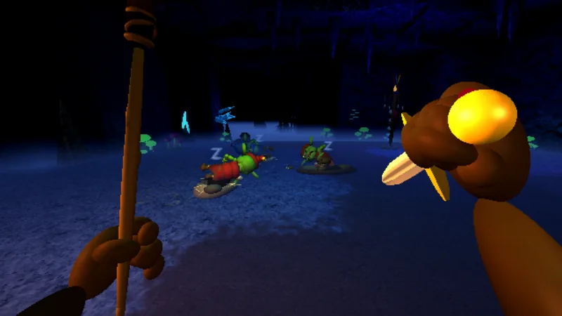 A first-person view of a staff and a hand, with sleeping goblins ahead in a dark cave.